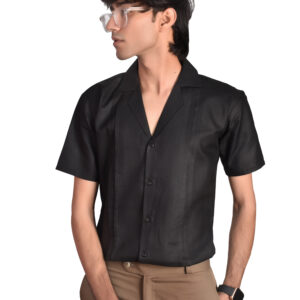 A model wearing black cuban collar shirt